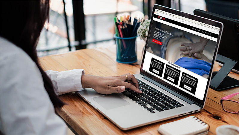 Woman taking CPR class on aedcpr.com. Example of good UX and UI design